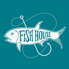Fish house logo badge lettering typography text on big tuna fish with fishing hook vector illustration