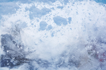 Ice background. The frozen texture of the water