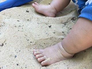 feet in the sand