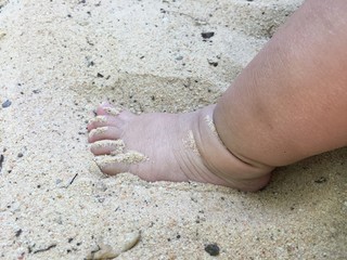 feet on the beach