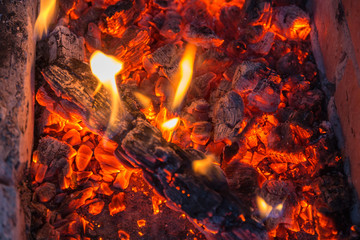 red burning coals closeup