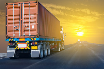 Truck on highway road with red  container, transportation concept.,import,export logistic industrial Transporting Land transport on the asphalt expressway with sunrise sky