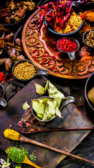 Top view Thai spices and herbs ingredient decoration on wood table for cook in home kitchen. 