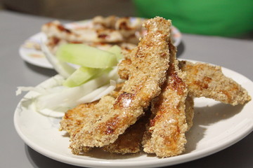 tender chicken breaded with vegetables