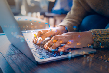 Businessman using a laptop computer with technology cybersecurity and privacy concept. protection...