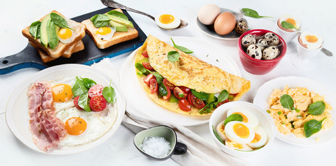 Fototapeta na wymiar Tradidional egg dishes for breakfast. Essential Ways to Cook an Egg