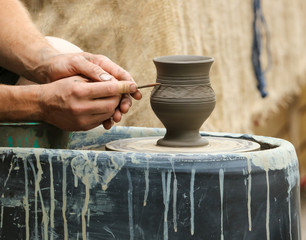 Making pottery manually in the workshop