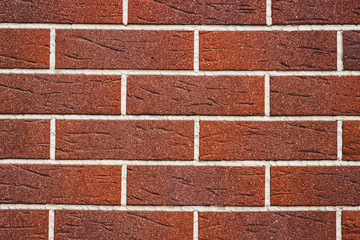 Texture: red brick wall with white seams