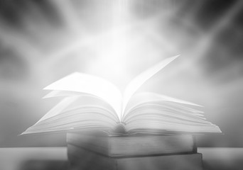 Imagine a picture book of an ancient book opened on a wooden table with a sparkling golden background. With magical power, magic, lightning around a glowing glowing book In the room of darkness