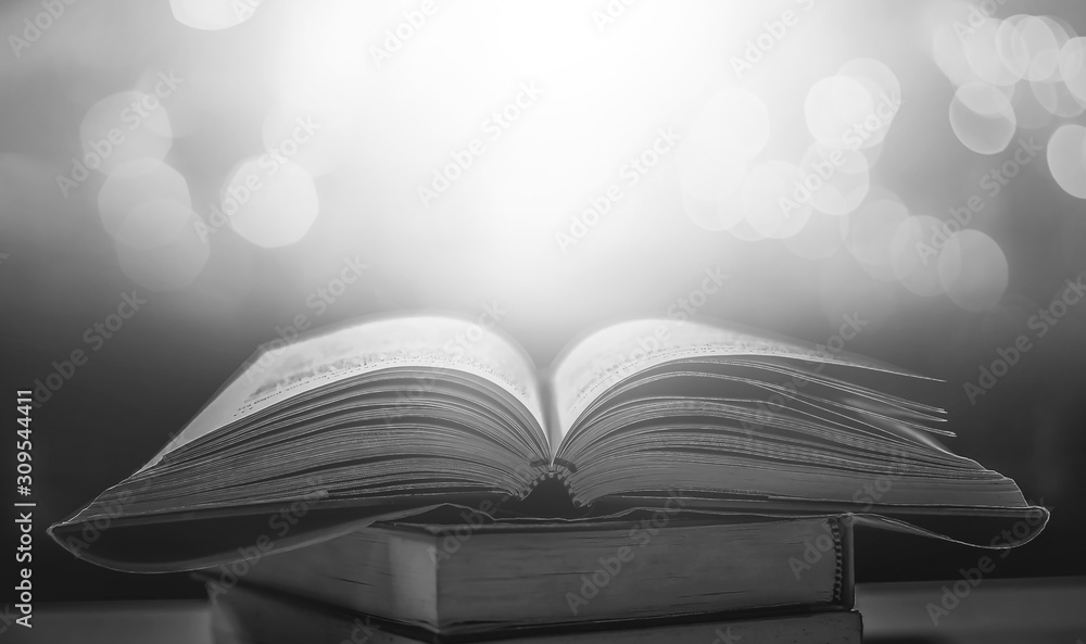 Poster stack of books in the library and blur bookshelf background