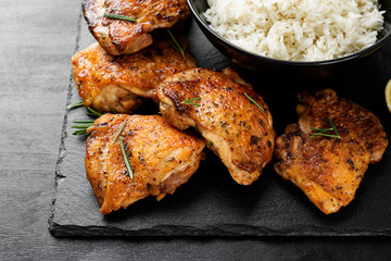 Grilled chicken thighs with spices and lemon. 