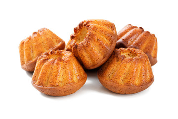 Mini bundt cakes or muffins with icing sugar isolated on white background.