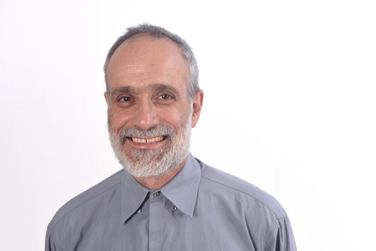 portrait of a middle-aged man with shirt and white background