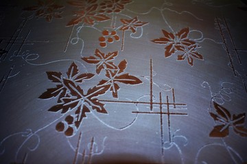 Engravings on a glass front of kitchen furniture