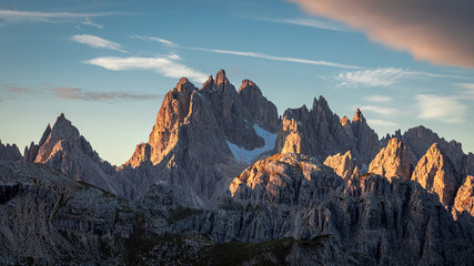 Mountain trail to Tre Cime in Dolomites at sunrise