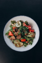 meat salad with large sliced vegetables