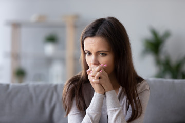 Pensive woman feel melancholic thinking recollecting memories