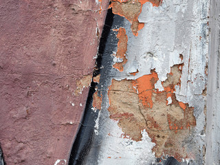 Texture of a brick wall painted with different colors