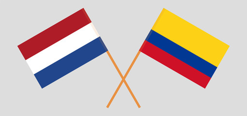 Crossed flags of Colombia and Netherlands