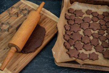 making Christmas butter cookies with cinnamon and chocolate