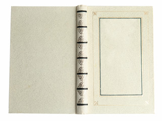 Open old book with vintage cover isolated on white, top view
