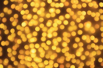 Abstract blur golden bokeh light Christmas holiday background