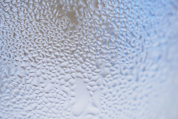Abstract water drops on glass surface texture