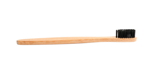 Bamboo toothbrush with charcoal bristle isolated on white