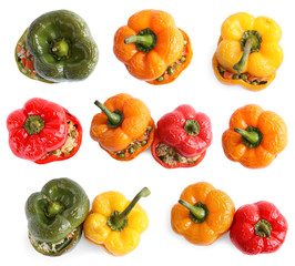 Set of delicious stuffed bell peppers on white background, top view