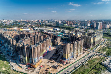 Fototapeta na wymiar Big city, aerial view. High-rise residential construction.