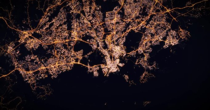 Aerial night view of city of Helsinki, Finland. Traffic and street light glowing. Camera flying high above, moving slowly forward from space filming cinematic straight down. 3d animation rendering.
