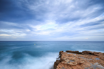 Seascape with a sea storm near the coast.