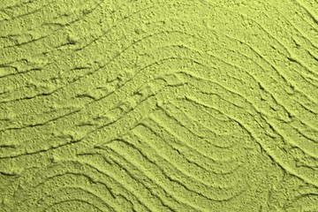 yellow rough curved stucco on wall texture - beautiful abstract photo background