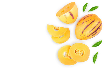 Fresh Pepino fruit with leaves isolated on white background with copy space for your text.. Top view, flat lay