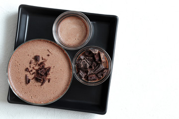 Chocolate cream dessert Panna cotta with chocolate pieces