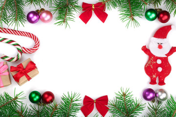 Christmas frame decorated with balls and bows isolated on white background with copy space for your text