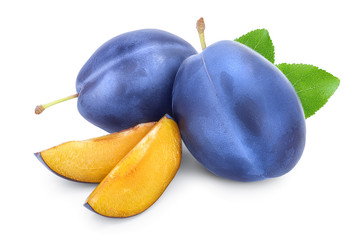 fresh blue plum and slices with leaves isolated on white background