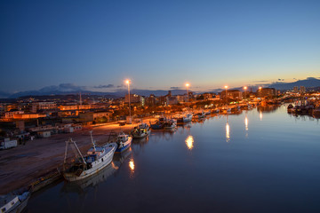 Fototapeta premium Illuminated Pescara View From the Bridge by Night of City and River in Abruzzo, Italy