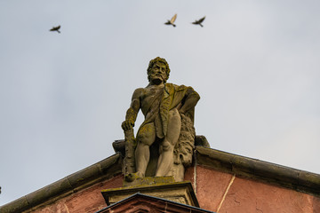 Statue of a Soldier with birds in Wurzburg Germany