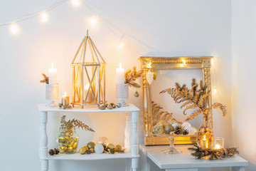 Christmas golden decor in white interior