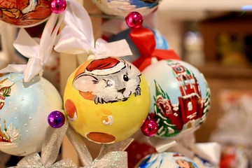 Blurred New year, winter holidays background with beautiful balls for traditional Christmas tree.