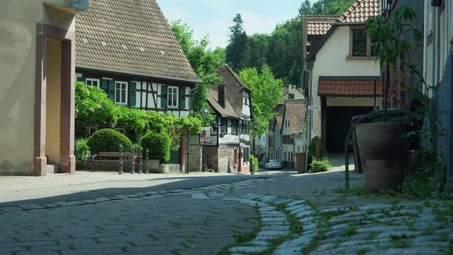 Typical German old town street. Sunny day, handheld. Weinheim, Germany.