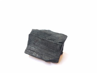 Activated  Charcoal  On  White  Background  With  Copy  Space.  Face  Scrub  And  Cleanser  Skin  care.  