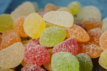 Multicolored fruity jelly candies as texture and background for design.  