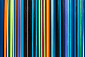 Details and texture of artistic colorful columns statue in the district La Defense in Paris, France