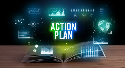 ACTION PLAN inscription coming out from an open book, creative business concept