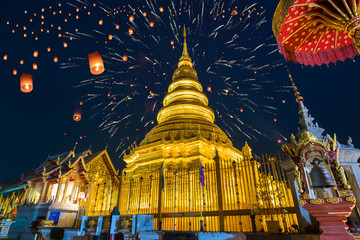 Loy Krathong Festival on twilight time and Floating lantern at Wat Phra That Hariphunchai Temple in Lamphun, Thailand