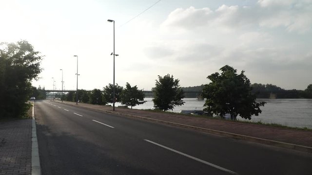 Road and promenade next river