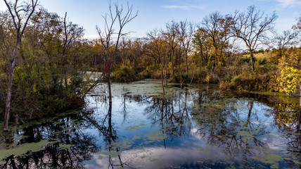 Morning over a rural countryside pond in Nebraska during autumn