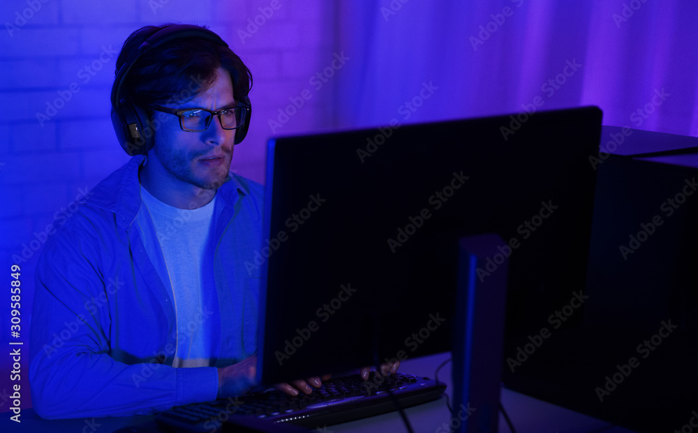 Poster Man in front of computer, using pc late in night